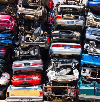 Discarded Junk Cars Piled Up After Crushing